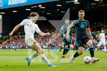 2022-03-13 - Leeds United midfielder Daniel James and Ben Gibson of Norwich during the English championship Premier League football match between Leeds United and Norwich City on March 13, 2022 at Elland Road in Leeds, England - LEEDS UNITED VS NORWICH CITY - ENGLISH PREMIER LEAGUE - SOCCER