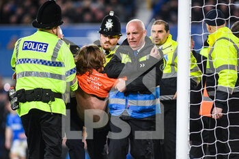 2022-03-17 - The fan protesting gets carried off the pitch during the English championship Premier League football match between Everton and Newcastle United on March 17, 2022 at Goodison Park in Liverpool, England - EVERTON VS NEWCASTLE UNITED - ENGLISH PREMIER LEAGUE - SOCCER