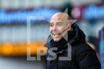 2022-04-02 - Manchester City's manager Pep Guardiola during the English championship Premier League football match between Burnley and Manchester City on April 2, 2022 at Turf Moor in Burnley, England - BURNLEY VS MANCHESTER CITY - ENGLISH PREMIER LEAGUE - SOCCER