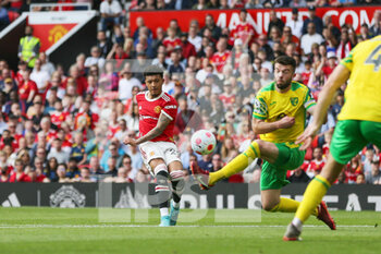 2022-04-17 - Manchester United Midfielder Jadon Sancho (25) shoots during the English championship Premier League football match between Manchester United and Norwich City on April 16, 2022 at Old Trafford in Manchester, England - MANCHESTER UNITED VS NORWICH CITY - ENGLISH PREMIER LEAGUE - SOCCER
