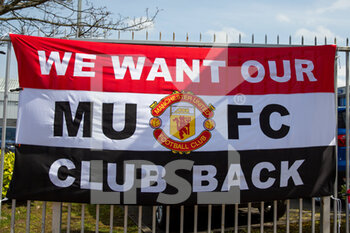 2022-04-17 - We want our club back flag ahead of the English championship Premier League football match between Manchester United and Norwich City on April 16, 2022 at Old Trafford in Manchester, England - MANCHESTER UNITED VS NORWICH CITY - ENGLISH PREMIER LEAGUE - SOCCER