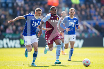 2022-04-23 - Timothy Castagne of Leicester and Aston Villa midfielder Leon Bailey during the English championship Premier League football match between Leicester City and Aston Villa on April 23, 2022 at the King Power Stadium in Leicester, England - LEICESTER CITY VS ASTON VILLA - ENGLISH PREMIER LEAGUE - SOCCER