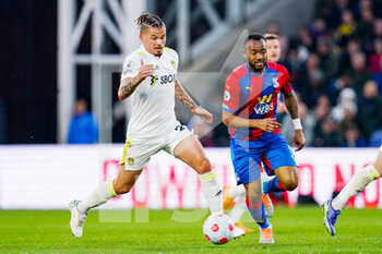 2022-04-25 - Leeds United midfielder Kalvin Phillips and Jordan Ayew of Crystal Palace during the English championship Premier League football match between Crystal Palace and Leeds United on April 25, 2022 at Selhurst Park in London, England - CRYSTAL PALACE VS LEEDS UNITED - ENGLISH PREMIER LEAGUE - SOCCER