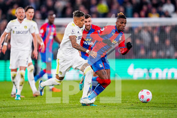 2022-04-25 - Leeds United forward Raphinha (10) and Crystal Palace forward Wilfried Zaha (11) during the English championship Premier League football match between Crystal Palace and Leeds United on April 25, 2022 at Selhurst Park in London, England - CRYSTAL PALACE VS LEEDS UNITED - ENGLISH PREMIER LEAGUE - SOCCER
