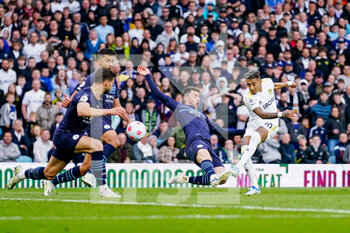 2022-04-30 - Leeds United forward Raphinha (10) takes a shot during the English championship Premier League football match between Leeds United and Manchester City on April 30, 2022 at Elland Road in Leeds, England - LEEDS UNITED VS MANCHESTER CITY - ENGLISH PREMIER LEAGUE - SOCCER