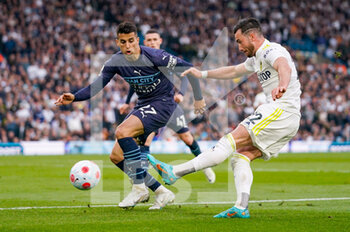 2022-04-30 - Leeds United midfielder Jack Harrison (22) takes a shot during the English championship Premier League football match between Leeds United and Manchester City on April 30, 2022 at Elland Road in Leeds, England - LEEDS UNITED VS MANCHESTER CITY - ENGLISH PREMIER LEAGUE - SOCCER