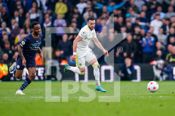 2022-04-30 - Leeds United midfielder Jack Harrison (22) and Manchester City forward Raheem Sterling (7) during the English championship Premier League football match between Leeds United and Manchester City on April 30, 2022 at Elland Road in Leeds, England - LEEDS UNITED VS MANCHESTER CITY - ENGLISH PREMIER LEAGUE - SOCCER