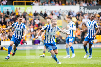 2022-04-30 - Brighton & Hove Albion midfielder Alexis MacAllister (10) celebrates his goal 0-1 during the English championship Premier League football match between Wolverhampton Wanderers and Brighton and Hove Albion on April 30, 2022 at Molineux stadium in Wolverhampton, England - WOLVERHAMPTON WANDERERS VS BRIGHTON VS HOVE ALBION - ENGLISH PREMIER LEAGUE - SOCCER