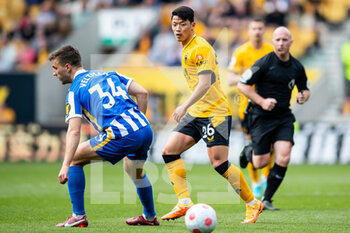 2022-04-30 - Wolverhampton Wanderers Hee Chan Hwang during the English championship Premier League football match between Wolverhampton Wanderers and Brighton and Hove Albion on April 30, 2022 at Molineux stadium in Wolverhampton, England - WOLVERHAMPTON WANDERERS VS BRIGHTON VS HOVE ALBION - ENGLISH PREMIER LEAGUE - SOCCER