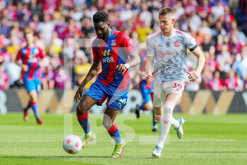 2022-05-23 - Crystal Palace Odsonne Edouard battles with Manchester United Midfielder Scott McTominay during the English championship Premier League football match between Crystal Palace and Manchester United on May 22, 2022 at Selhurst Park in London, England - CRYSTAL PALACE VS MANCHESTER UNITED - ENGLISH PREMIER LEAGUE - SOCCER