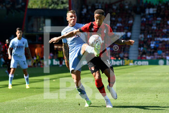 2022-08-06 - Marcus Tavernier (16) of AFC Bournemouth battles for possession with Lucas Digne (27) of Aston Villa during the English championship Premier League football match between Bournemouth and Aston Villa on August 6, 2022 at the Vitality Stadium in Bournemouth, England - FOOTBALL - ENGLISH CHAMP - BOURNEMOUTH V ASTON VILLA - ENGLISH PREMIER LEAGUE - SOCCER