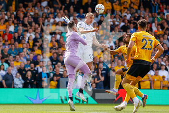 2022-08-06 - Leeds United defender Rasmus Kristensen (25) is challenged by Wolverhampton Wanderers goalkeeper Jose Sa during the English championship Premier League football match between Leeds United and Wolverhampton Wanderers on August 6, 2022 at Elland Road in Leeds, England - FOOTBALL - ENGLISH CHAMP - LEEDS V WOLVERHAMPTON - ENGLISH PREMIER LEAGUE - SOCCER