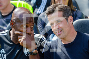 2022-08-06 - Fulham first team coach Luis Boa Morte and Fulham manager Marco Silva during the English championship Premier League football match between Fulham and Liverpool on August 6, 2022 at Craven Cottage in London, England - FOOTBALL - ENGLISH CHAMP - FULHAM V LIVERPOOL - ENGLISH PREMIER LEAGUE - SOCCER