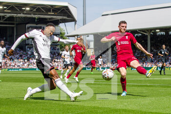 2022-08-06 - Fulham defender Kenny Tete, Liverpool defender Andrew Robertson during the English championship Premier League football match between Fulham and Liverpool on August 6, 2022 at Craven Cottage in London, England - FOOTBALL - ENGLISH CHAMP - FULHAM V LIVERPOOL - ENGLISH PREMIER LEAGUE - SOCCER