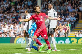 2022-08-06 - Liverpool forward Mohamed Salah (11) scores and celebrates 2-2 during the English championship Premier League football match between Fulham and Liverpool on August 6, 2022 at Craven Cottage in London, England - FOOTBALL - ENGLISH CHAMP - FULHAM V LIVERPOOL - ENGLISH PREMIER LEAGUE - SOCCER