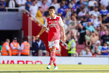 2022-08-13 - Takehiro Tomiyasu (18) of Arsenal during the English championship Premier League football match between Arsenal and Leicester City on August 13, 2022 at the Emirates Stadium in London, England - FOOTBALL - ENGLISH CHAMP - ARSENAL V LEICESTER - ENGLISH PREMIER LEAGUE - SOCCER