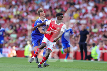 2022-08-13 - Eddie Nketiah (14) of Arsenal tussles with James Maddison (10) of Leicester City during the English championship Premier League football match between Arsenal and Leicester City on August 13, 2022 at the Emirates Stadium in London, England - FOOTBALL - ENGLISH CHAMP - ARSENAL V LEICESTER - ENGLISH PREMIER LEAGUE - SOCCER