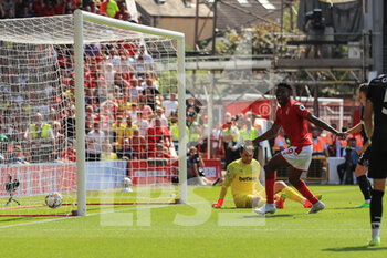 2022-08-14 - Taiwo Awoniyi (9) of Nottingham Forest scores a goal 1-0 during the English championship Premier League football match between Nottingham Forest and West Ham United on August 14, 2022 at the City Ground in Nottingham, England - FOOTBALL - ENGLISH CHAMP - NOTTINGHAM FOREST V WEST HAM - ENGLISH PREMIER LEAGUE - SOCCER