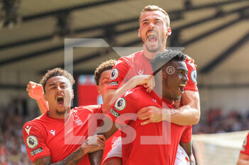 2022-08-14 - Taiwo Awoniyi (9) of Nottingham Forest celebrates his goal 1-0 with teammates during the English championship Premier League football match between Nottingham Forest and West Ham United on August 14, 2022 at the City Ground in Nottingham, England - FOOTBALL - ENGLISH CHAMP - NOTTINGHAM FOREST V WEST HAM - ENGLISH PREMIER LEAGUE - SOCCER