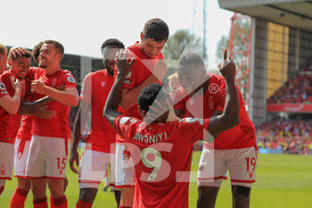 2022-08-14 - Taiwo Awoniyi (9) of Nottingham Forest celebrates his goal 1-0 with Moussa Niakhate during the English championship Premier League football match between Nottingham Forest and West Ham United on August 14, 2022 at the City Ground in Nottingham, England - FOOTBALL - ENGLISH CHAMP - NOTTINGHAM FOREST V WEST HAM - ENGLISH PREMIER LEAGUE - SOCCER