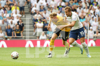 2022-08-20 - Wolverhampton Wanderers defender Nathan Collins (4) and Tottenham Hotspur forward Harry Kane during the English championship Premier League football match between Tottenham Hotspur and Wolverhampton Wanderers on August 20, 2022 at Tottenham Hotspur Stadium in London, England - FOOTBALL - ENGLISH CHAMP - TOTTENHAM V WOLVERHAMPTON - ENGLISH PREMIER LEAGUE - SOCCER