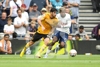 2022-08-20 - Wolverhampton Wanderers midfielder Goncalo Guedes (17) and Tottenham Hotspur defender Emerson Royal (12) during the English championship Premier League football match between Tottenham Hotspur and Wolverhampton Wanderers on August 20, 2022 at Tottenham Hotspur Stadium in London, England - FOOTBALL - ENGLISH CHAMP - TOTTENHAM V WOLVERHAMPTON - ENGLISH PREMIER LEAGUE - SOCCER
