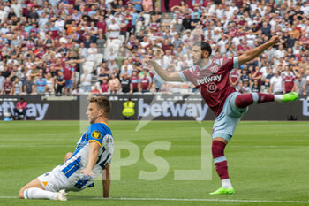 2022-08-21 - Brighton and Hove Albion defender Joel Veltman (34), West Ham United striker Said Benrahma during the English championship Premier League football match between West Ham United and Brighton and Hove Albion on August 21, 2022 at the London Stadium in London, England - FOOTBALL - ENGLISH CHAMP - WEST HAM V BRIGHTON - ENGLISH PREMIER LEAGUE - SOCCER