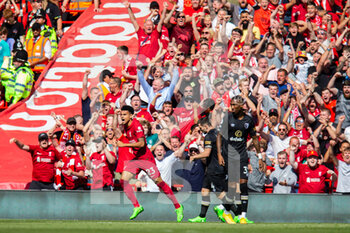 2022-08-27 - Liverpool's forward Luis Diaz (23) scores and celebrates 1-0 during the English championship Premier League football match between Liverpool and Bournemouth on August 27, 2022 at Anfield in Liverpool, England - FOOTBALL - ENGLISH CHAMP - LIVERPOOL V BOURNEMOUTH - ENGLISH PREMIER LEAGUE - SOCCER