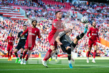 2022-08-27 - Bournemouth's midfielder Ryan Christie (10) attempts an over head kick, Andrew Robertson of Liverpool during the English championship Premier League football match between Liverpool and Bournemouth on August 27, 2022 at Anfield in Liverpool, England - FOOTBALL - ENGLISH CHAMP - LIVERPOOL V BOURNEMOUTH - ENGLISH PREMIER LEAGUE - SOCCER