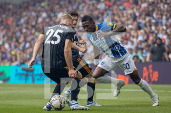2022-08-27 - Leeds United defender Rasmus Kristensen (25) & Brighton and Hove Albion defender Pervis Estupinan (30) during the English championship Premier League football match between Brighton and Hove Albion and Leeds United on August 27, 2022 at the American Express Community Stadium in Brighton and Hove, England - FOOTBALL - ENGLISH CHAMP - BRIGHTON V LEEDS - ENGLISH PREMIER LEAGUE - SOCCER