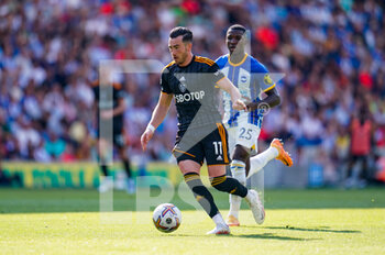 2022-08-27 - Leeds United midfielder Jack Harrison during the English championship Premier League football match between Brighton and Hove Albion and Leeds United on August 27, 2022 at the American Express Community Stadium in Brighton and Hove, England - FOOTBALL - ENGLISH CHAMP - BRIGHTON V LEEDS - ENGLISH PREMIER LEAGUE - SOCCER