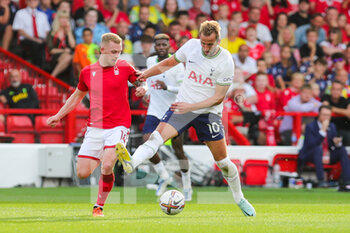 2022-08-28 - Harry Kane (10) of Tottenham Hotspur and Lewis O'Brien (14) of Nottingham Forest during the English championship Premier League football match between Nottingham Forest and Tottenham Hotspur on August 28, 2022 at the City Ground in Nottingham, England - FOOTBALL - ENGLISH CHAMP - NOTTINGHAM FOREST V TOTTENHAM - ENGLISH PREMIER LEAGUE - SOCCER