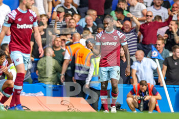 2022-09-03 - Goal 0-1 Michail Antonio (9) of West Ham United scores a goal and celebrates during the Premier League match between Chelsea and West Ham United at Stamford Bridge, London, England on 3 September 2022. Photo Nigel Keene / ProSportsImages / DPPI - FOOTBALL - ENGLISH CHAMP - CHELSEA V WEST HAM - ENGLISH PREMIER LEAGUE - SOCCER
