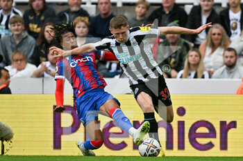 2022-09-03 - Crystal Palace's Michael Olise tackles Newcastle's Elliot Anderson during the Premier League match between Newcastle United and Crystal Palace at St. James’ Park, Newcastle, England on 3 September 2022. Photo Malcolm Mackenzie / ProSportsImages / DPPI - FOOTBALL - ENGLISH CHAMP - NEWCASTLE V CRYSTAL PALACE - ENGLISH PREMIER LEAGUE - SOCCER