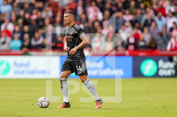 2022-09-18 - Granit Xhaka (34) of Arsenal during the Premier League match between Brentford and Arsenal at Gtech Community Stadium, Brentford, England on 18 September 2022. Photo Nigel Keene / ProSportsImages / DPPI - FOOTBALL - ENGLISH CHAMP - BRENTFORD V ARSENAL - ENGLISH PREMIER LEAGUE - SOCCER