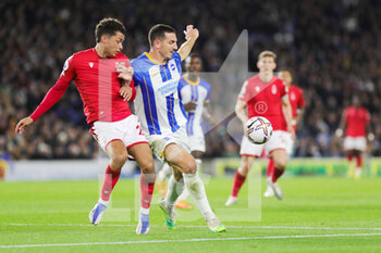 2022-10-19 - Brighton and Hove Albion defender Lewis Dunk (5) battles Brennan Johnson (20) of Nottingham Forest during the English championship Premier League football match between Brighton and Hove Albion and Nottingham Forest on October 18, 2022 at the American Express Community Stadium in Brighton and Hove, England - FOOTBALL - ENGLISH CHAMP - BRIGHTON V NOTTINGHAM - ENGLISH PREMIER LEAGUE - SOCCER