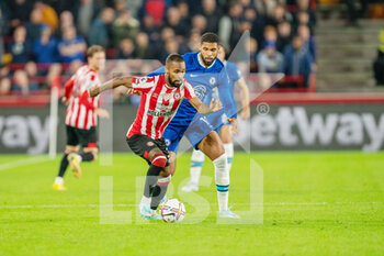 2022-10-19 - Brentford defender Rico Henry (3) under pressure from Chelsea midfielder Ruben Loftus-Cheek during the English championship Premier League football match between Brentford and Chelsea on October 19, 2022 at Gtech Community Stadium in Brentford, England - FOOTBALL - ENGLISH CHAMP - BRENTFORD V CHELSEA - ENGLISH PREMIER LEAGUE - SOCCER