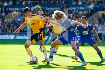 2022-10-23 - Wolverhampton Wanderers midfielder Matheus Nunes (27) battles for possession with Leicester City defender Wout Faes (3) during the English championship Premier League football match between Wolverhampton Wanderers and Leicester City on October 23, 2022 at Molineux in Wolverhampton, England - FOOTBALL - ENGLISH CHAMP - WOLVERHAMPTON V LEICESTER - ENGLISH PREMIER LEAGUE - SOCCER