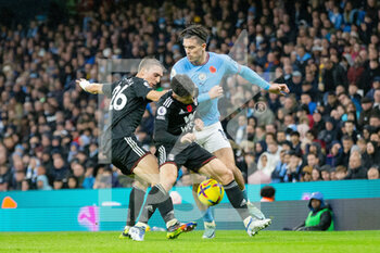 2022-11-05 - Fulham midfielder Joao Palhinha (26) and Fulham midfielder Harry Wilson (8) battles with Manchester City midfielder Jack Grealish (10) during the English championship Premier League football match between Manchester City and Fulham on November 5, 2022 at the Etihad Stadium in Manchester, England - FOOTBALL - ENGLISH CHAMP - MANCHESTER CITY V FULHAM - ENGLISH PREMIER LEAGUE - SOCCER