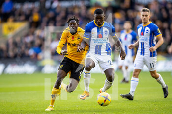 2022-11-05 - Brighton & Hove Albion midfielder Moises Caicedo (25) and Boubacar Traore of Wolverhampton Wanderers during the English championship Premier League football match between Wolverhampton Wanderers and Brighton and Hove Albion on November 5, 2022 at Molineux stadium in Wolverhampton, England - FOOTBALL - ENGLISH CHAMP - WOLVERHAMPTON V BRIGHTON - ENGLISH PREMIER LEAGUE - SOCCER