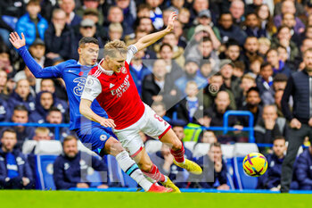 2022-11-06 - Thiago Silva (6) of Chelsea tackles Martin Odegaard (8) of Arsenal during the English championship Premier League football match between Chelsea and Arsenal on November 5, 2022 at Stamford Bridge in London, England - FOOTBALL - ENGLISH CHAMP - CHELSEA V ARSENAL - ENGLISH PREMIER LEAGUE - SOCCER