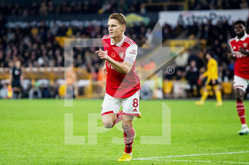 2022-11-12 - Arsenal midfielder Martin Odegaard (8) scores and celebrates 0-2 during the English championship Premier League football match between Wolverhampton Wanderers and Arsenal on November 12, 2022 at Molineux stadium in Wolverhampton, England - FOOTBALL - ENGLISH CHAMP - WOLVERHAMPTON V ARSENAL - ENGLISH PREMIER LEAGUE - SOCCER