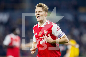 2022-11-12 - Arsenal midfielder Martin Odegaard (8) scores and celebrates 0-1 during the English championship Premier League football match between Wolverhampton Wanderers and Arsenal on November 12, 2022 at Molineux stadium in Wolverhampton, England - FOOTBALL - ENGLISH CHAMP - WOLVERHAMPTON V ARSENAL - ENGLISH PREMIER LEAGUE - SOCCER