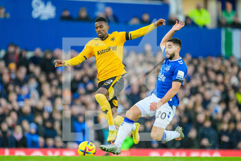 2022-12-26 - Wolves Nelson Semedo tackles Everton's Neal Maupay during the English championship Premier League football match between Everton and Wolverhampton Wanderers on December 26, 2022 at Goodison Park in Liverpool, England - FOOTBALL - ENGLISH CHAMP - EVERTON V WOLVERHAMPTON - ENGLISH PREMIER LEAGUE - SOCCER