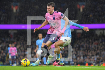 2022-12-31 - Everton defender Nathan Patterson (3) challenged by Manchester City midfielder Jack Grealish during the English championship Premier League football match between Manchester City and Everton on 31 December 2022 at the Etihad Stadium in Manchester, England - FOOTBALL - ENGLISH CHAMP - MANCHESTER CITY V EVERTON - ENGLISH PREMIER LEAGUE - SOCCER