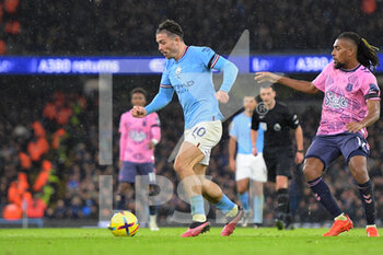 2022-12-31 - Manchester City midfielder Jack Grealish (10) beats Everton midfielder Alex Iwobi (17) during the English championship Premier League football match between Manchester City and Everton on 31 December 2022 at the Etihad Stadium in Manchester, England - FOOTBALL - ENGLISH CHAMP - MANCHESTER CITY V EVERTON - ENGLISH PREMIER LEAGUE - SOCCER