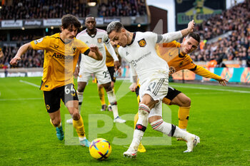 2022-12-31 - Manchester United forward Antony (21) battles for possession during the English championship Premier League football match between Wolverhampton Wanderers and Manchester United on 31 December 2022 at Molineux stadium in Wolverhampton, England - FOOTBALL - ENGLISH CHAMP - WOLVERHAMPTON V MANCHESTER UNITED - ENGLISH PREMIER LEAGUE - SOCCER