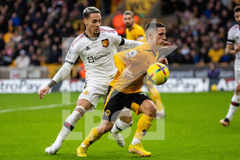 2022-12-31 - Wolverhampton Wanderers forward Daniel Podence (10), Manchester United forward Antony during the English championship Premier League football match between Wolverhampton Wanderers and Manchester United on 31 December 2022 at Molineux stadium in Wolverhampton, England - FOOTBALL - ENGLISH CHAMP - WOLVERHAMPTON V MANCHESTER UNITED - ENGLISH PREMIER LEAGUE - SOCCER