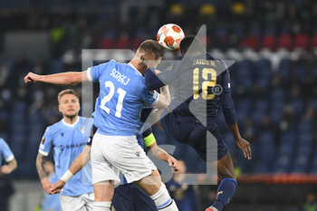2022-02-24 - Sergej Milinković-Savić of SS LAZIO and Zaidu of F.C. Porto in action during the Knockout Round Play-Offs Leg Two - UEFA Europa League between SS Lazio and FC Porto at Stadio Olimpico on 24th of February, 2022 in Rome, Italy. - SS LAZIO VS FC PORTO - UEFA EUROPA LEAGUE - SOCCER