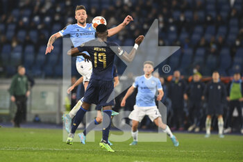 2022-02-24 - Sergej Milinković-Savić of SS LAZIO and Chancel Mbemba of F.C. Porto in action during the Knockout Round Play-Offs Leg Two - UEFA Europa League between SS Lazio and FC Porto at Stadio Olimpico on 24th of February, 2022 in Rome, Italy. - SS LAZIO VS FC PORTO - UEFA EUROPA LEAGUE - SOCCER